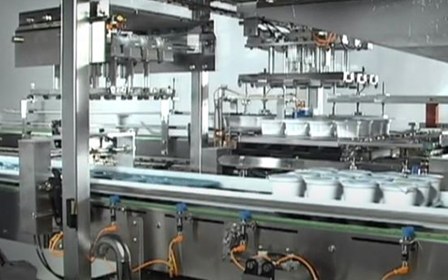 Waldner DOSOMAT Rotary Machine - Filling & Sealing Yogurt in Cups